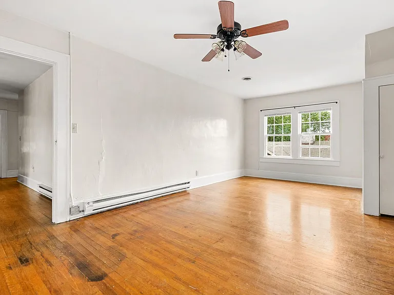 Large front bedroom / living room or bonus space. See floor plan for measurements.
