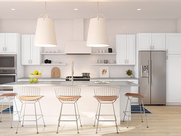 Kitchen with pendant lighting and floating shelves