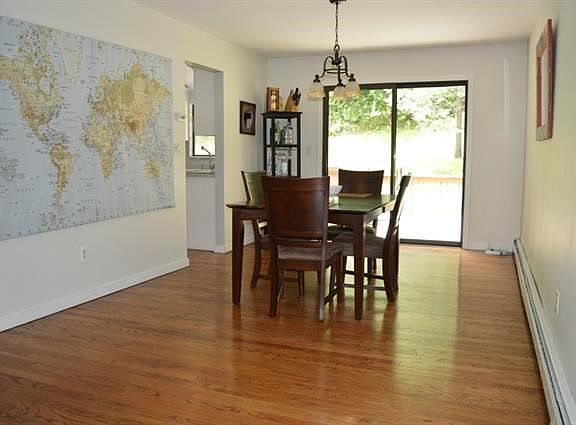 Formal dining room with SGD to rear deck.  The perfect layout for entertaining.