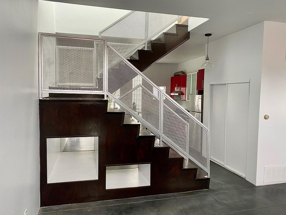 Black polished concrete downstairs - bamboo upstairs