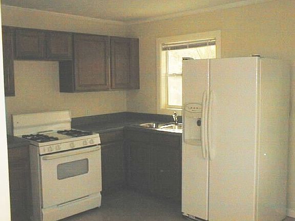 Kitchen. New cabinets, new ceramic tile floor, new appliances