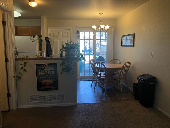 Dining room/back entry. Door to garage.