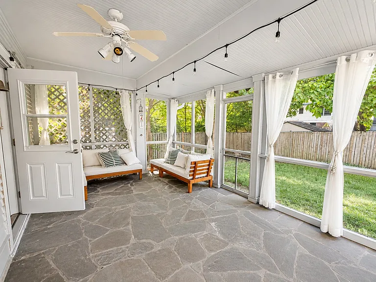 Back patio/screened in porch.