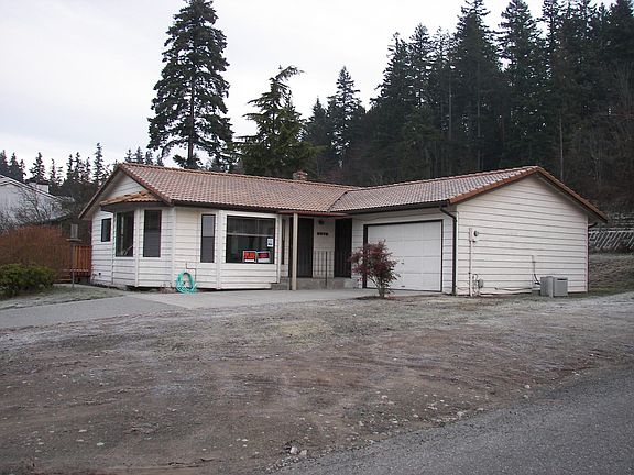 View of front of house from Misty Ridge Lane