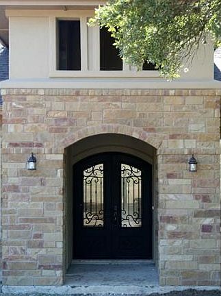 This grand entrance with double steel canterra style doors provides a welcome yet secure entrance to the home of your dreams