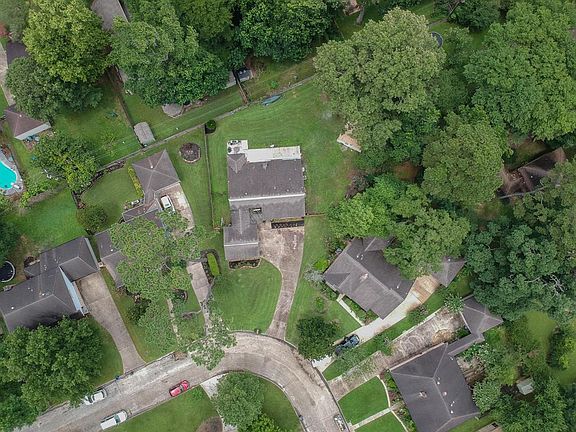 Home is located on spacious lot at end of horseshoe drive Mature trees.