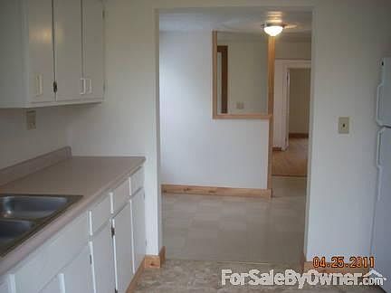 KITCHEN LOOKING INTO DINING ROOM