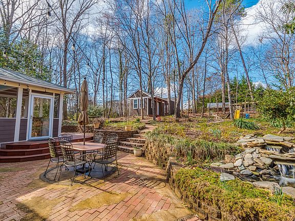 Back patio with operating water feature