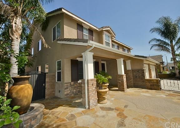 The fountain adds the the serenity of this front courtyard.
