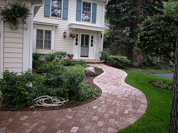 All new paver walkway and driveway trim