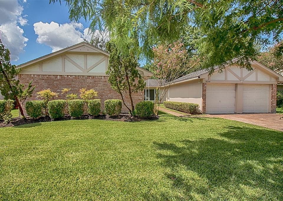 Beautiful three bedroom home with lush landscaping and great curb appeal.