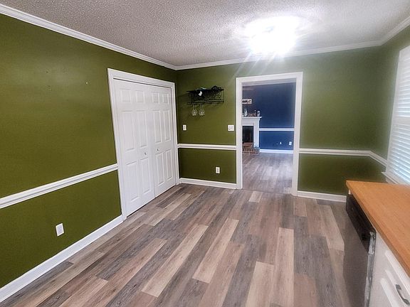 Kitchen looking into living room
