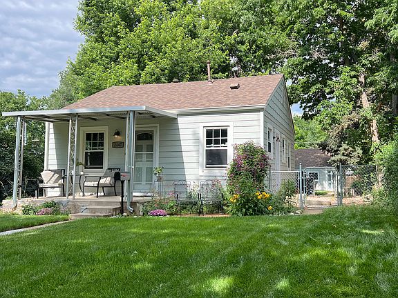 Front of house with side yard from kitchen.