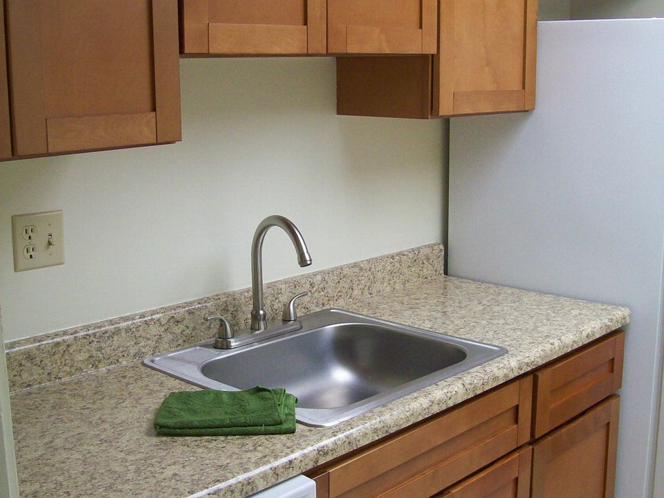 Brand New Eat In Kitchen With Custom Cabinetry And New Appli