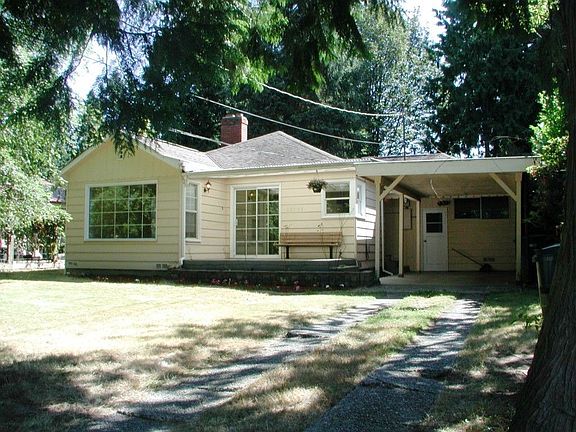 front of house, large yard