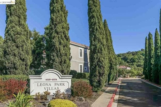 Entryway into the Leona Park Villas. Private security cameras are installed at both entrances. Long driveway leads to large courtyard with fountain creating safe space for children to play