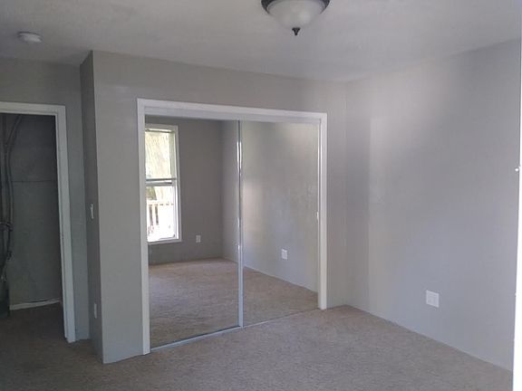 bedroom 1 (has second door to private fenced rear yard)