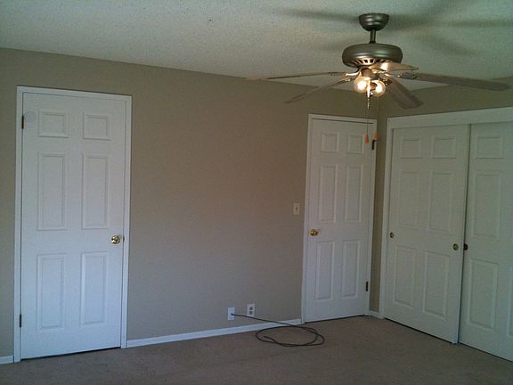 Master Bdrm-door to Mstr Bath + door to hall + triple wide c