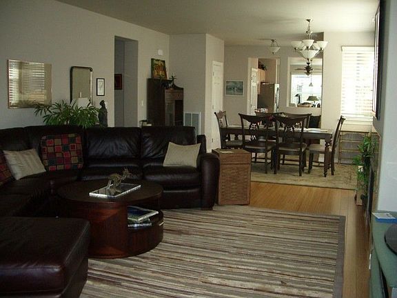 Living room and dining combined, but separate. Bamboo flooring.