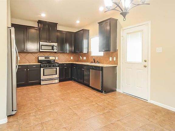 5th image of 10119 Larch Creek St
