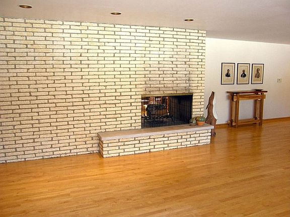 Living Room with Hardwood Floors and Great Fireplace