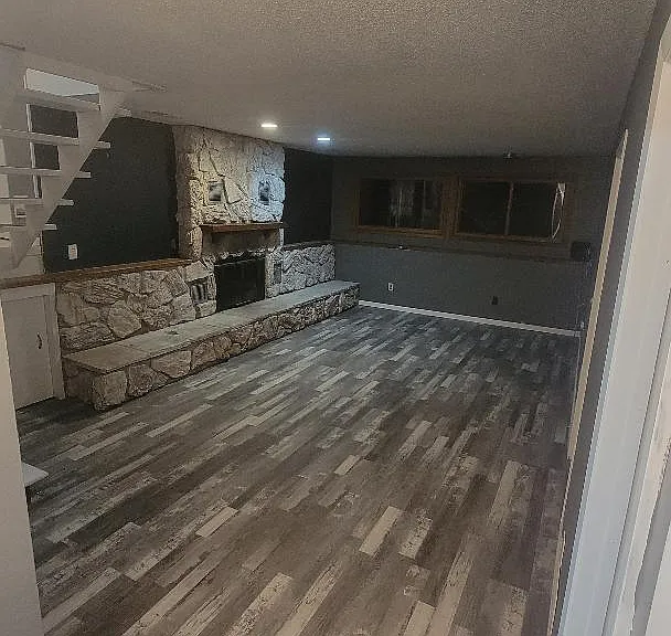 Basement with wood burning fireplace