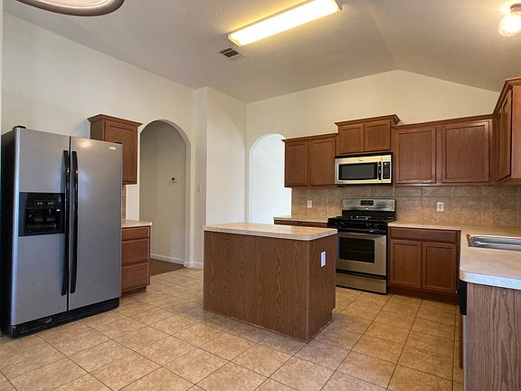 bright, spacious kitchen, with under counter lighting