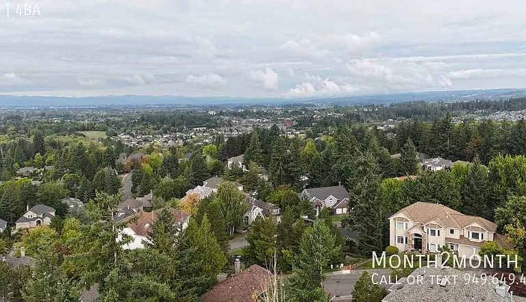 9021 NW Bartholomew Dr — Photo 39