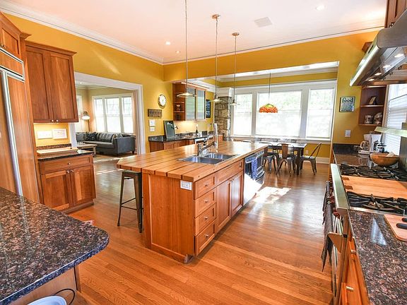 The kitchen features a huge island, large dining table and restaurant-grade appliances! Tons of cooking gear and a nice array of spices & oil is supplied. A coffee maker, filters, coffee, tea and other beverage goodies are provided. There are enough plate