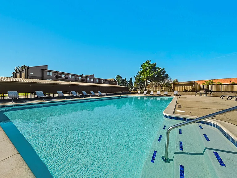 Sparkling Swimming Pool and Sun Deck at Franklin River Apartments in Southfield, MI