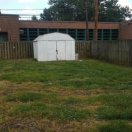 Backyard with shed and fence