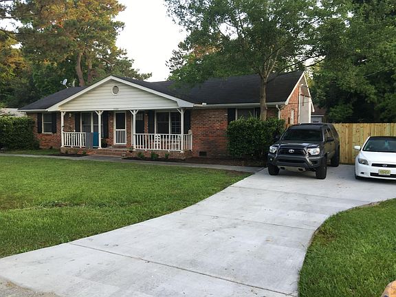 Front yard from B side. Each unit has its own dedicated driveway. Note: this picture was taken prior to roof and front doors being replaced.