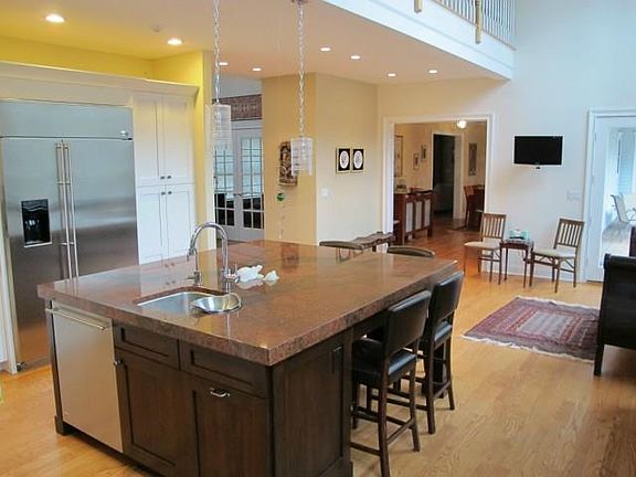 Preparation sink, 2 dishwashers, 2 ovens. Wolf Stove, GE Monoram Appliances