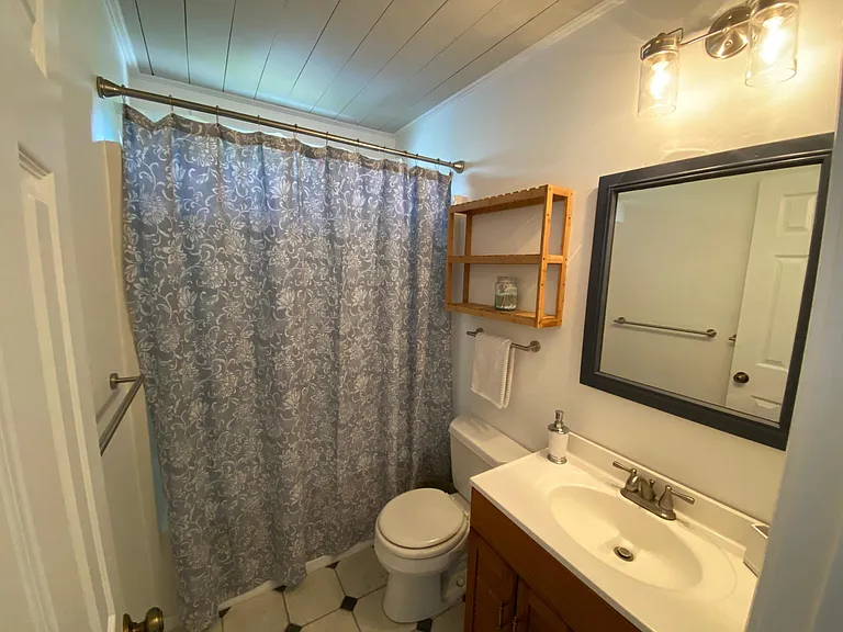 Upstairs bath -- has tub w/ shower