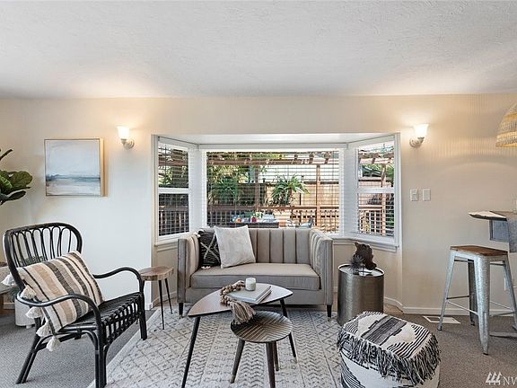 All the windows have been updated with energy efficient, double pane windows. This bay window looks right out onto the deck.