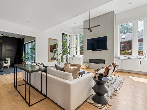 Spacious living room with lots of natural light and comfortable seating. Smart TV with all the streaming apps. Please note the fireplace is not available for use.