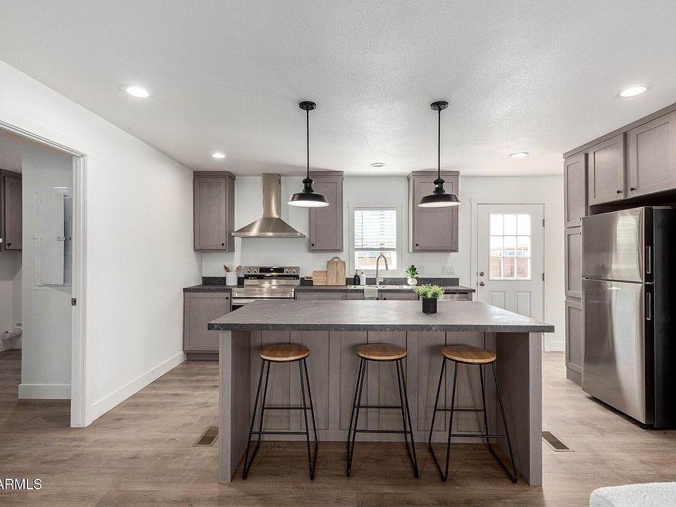 1st image of 8227 E 5TH Avenue