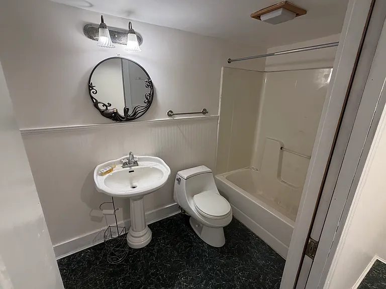 Downstairs full bathroom off the kitchen/laundry room