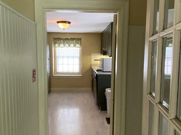 Entry from that covered doorway into kitchen.