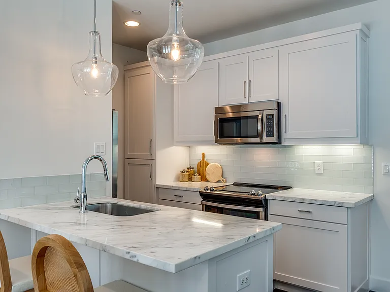 **Photos of Unit 1 to show lived in potential. Unit 5 is the same floorpan, finish outs and size.**