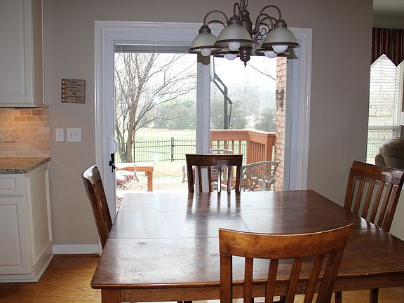 Kitchen eating area with great view to backyard.