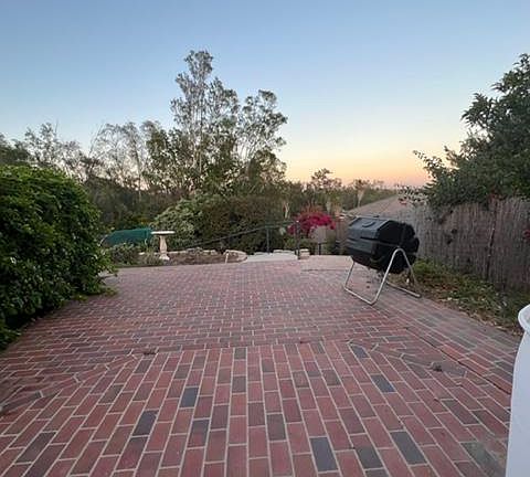 brick road on house level facing lower garden