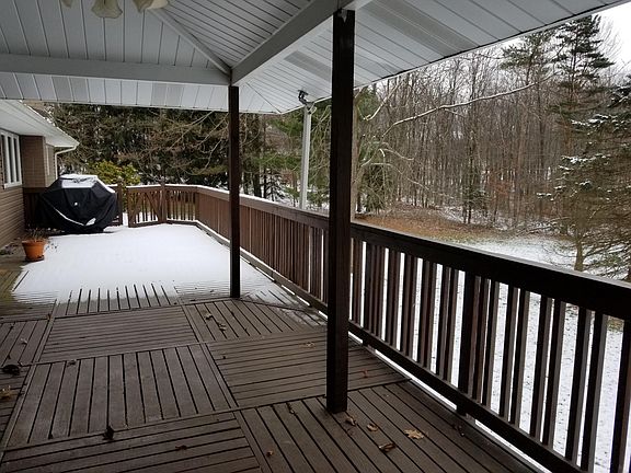 A view of the deck showing where there is a gas grill hookup.