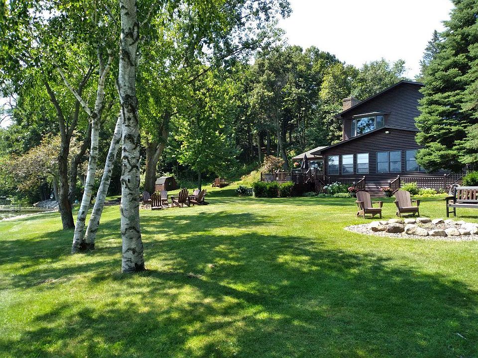 Front of property, 200 feet of private lakeshore with dock