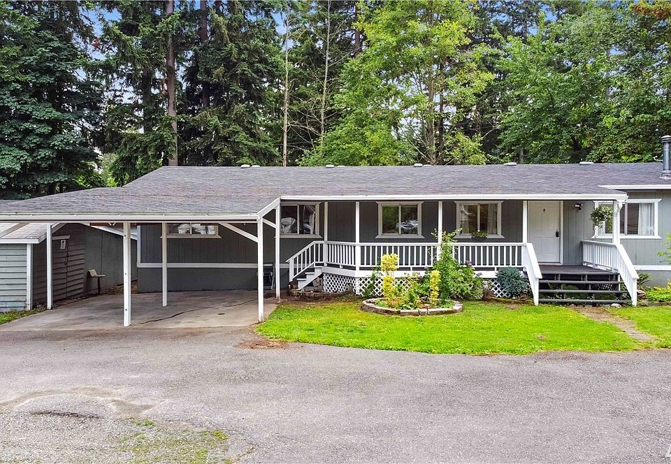 What a great place to call HOME!! Ample parking with two car covered carport + shed for all your yard maintenance tools & more! Enjoy sitting or swinging on the large covered front deck.