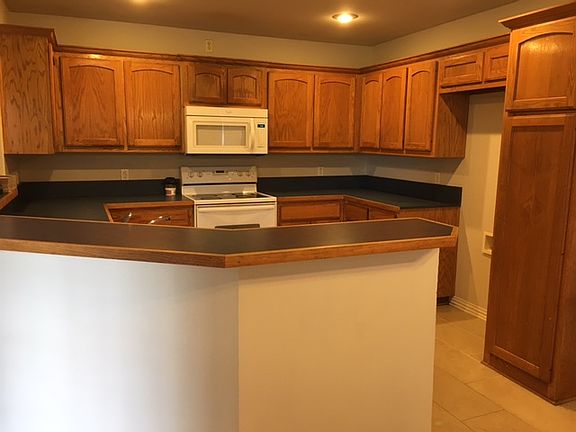 Kitchen. View is from the dining space.