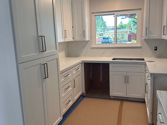 New kitchen ( floor covered ) New Stainless Steel Appliances to be installed