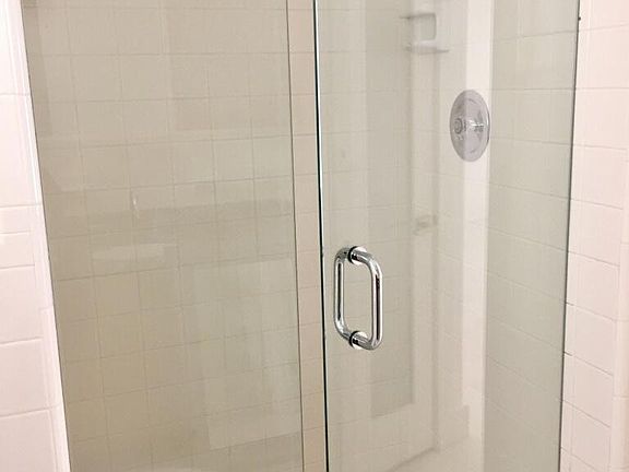 Walk in shower with glass doors