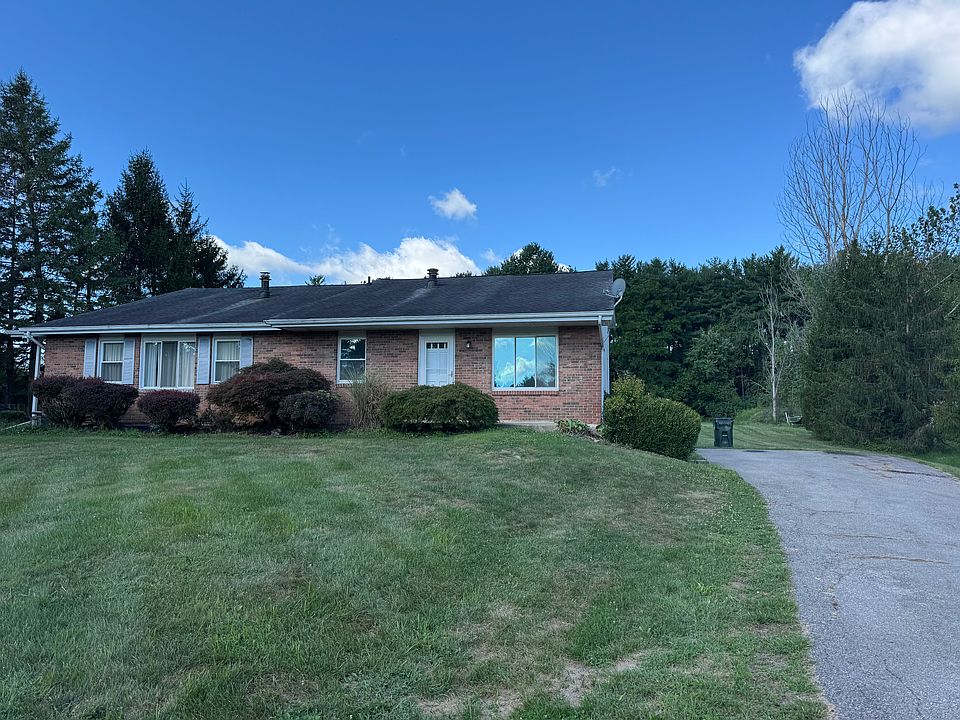 Brick front with large lot