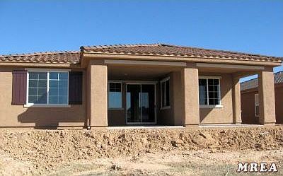 Back of Home w/Spacious Covered Patio